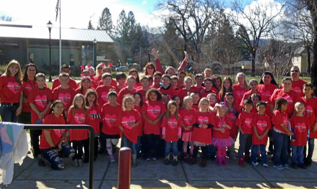 Pictured are the Minnie Cannon Elementary School students on Valentine’s Day as they head to the Middletown Senior Center. – contributed photo
